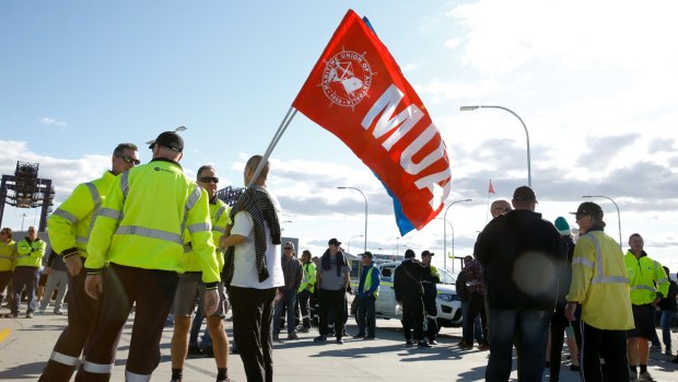 Hutchison Ports Australia's workers gather at Port Botany, Sydney, after being sacked by email.
