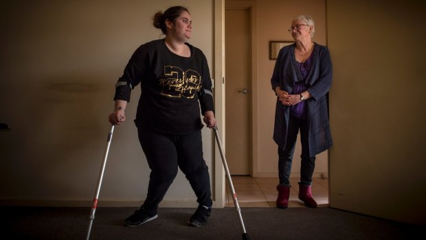 Setback: Gail King (right) says halting the physiotherapy has cost her daughter Jess (left) months of treatment. 