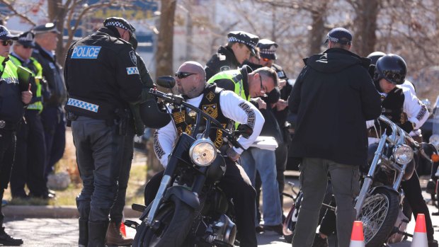 Police monitor the movements of the Commanchero bikies in Canberra on Saturday.