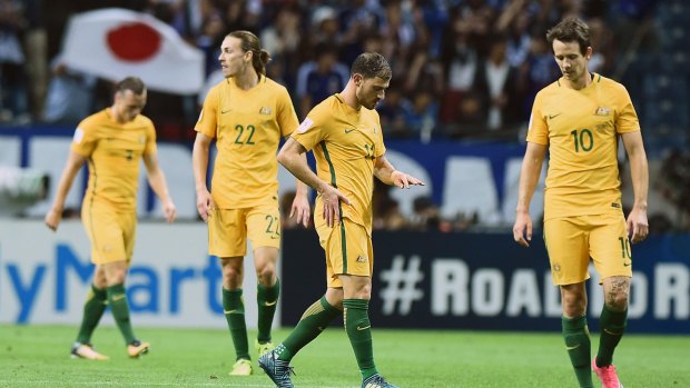Lacklustre: It was a disappointing night for the Socceroos in Tokyo.