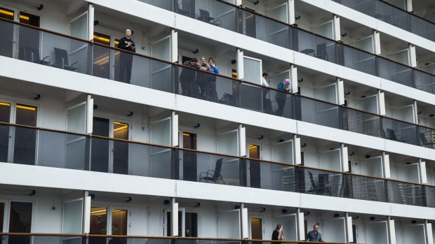 Passengers on the Carnival Spirit after it docked at Circular Quay.