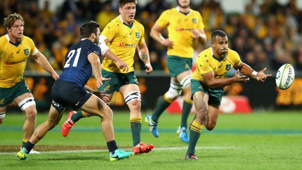 The Wallabies' Will Genia gets a pass away in Saturday's win over Argentina in Perth.