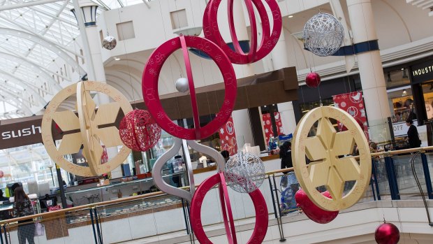 The shopping centres are opening late for the festive frenzy.