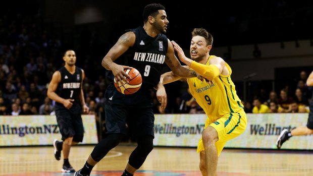 NBA hopeful: Corey Webster is challenged by Matthew Dellavedova during game two of the New Zealand Tall Blacks versus Australian Boomers series.