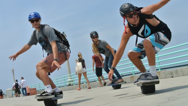 High-tech commuters glide past the road rules.