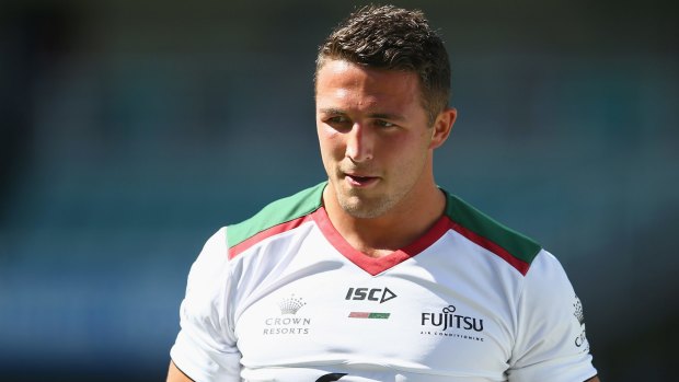 Support: Rabbitohs enforcer Sam Burgess says South Sydney coach Michael McGuire's record speaks for itself. 