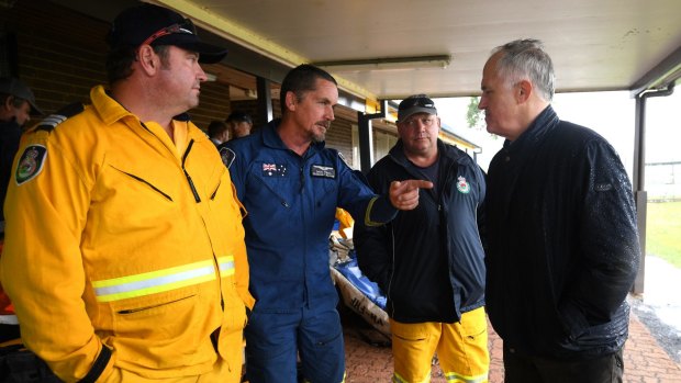 Prime Minister Malcolm Turnbull meets emergency service personnel. 