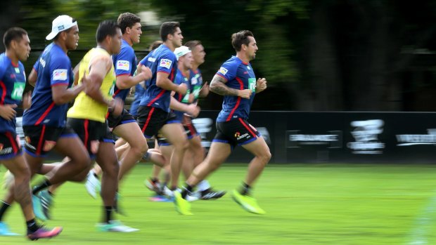 Leader of a new pack: Mitchell Pearce shows the way at Newcastle training.