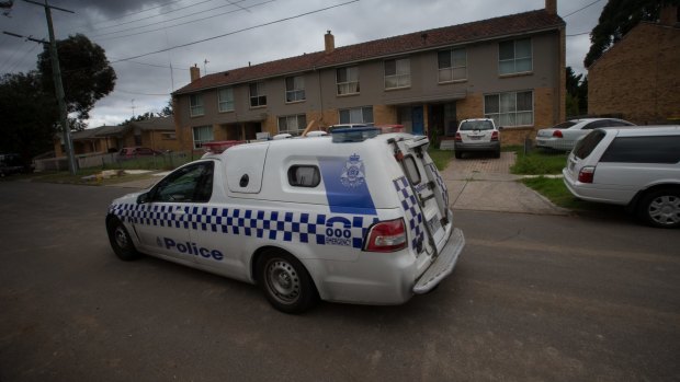 Police drive past the house in Perth Street, West Heidelberg where Sanaya Shaib had been living.
