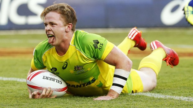 Henry Hutchison of Australia scores during the successful Sydney Sevens tournament.