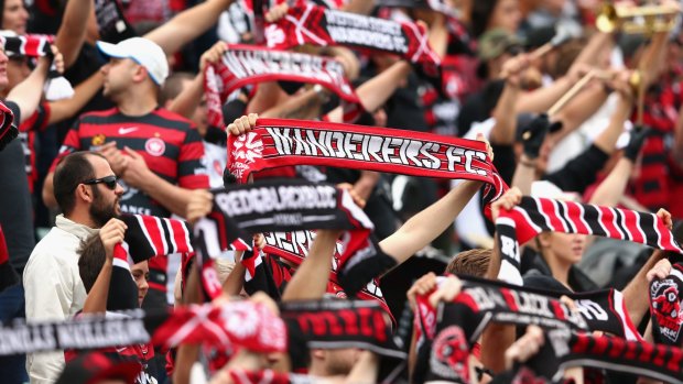Bloc and roll: Wanderers fans show their colours during an A-League match.