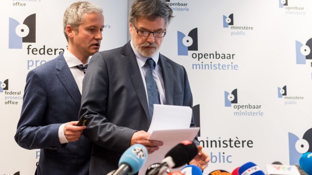 Spokesman for the Belgian Federal Prosecutors Office Thierry Werts, left, and Belgian Federal Prosecutor Eric Van Der Sypt  prepare to speak to media in Brussels on Wednesday.