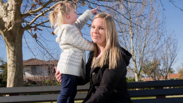 Cassandra Gibson with her two-year-old daughter, Ella, in a Perth park. 