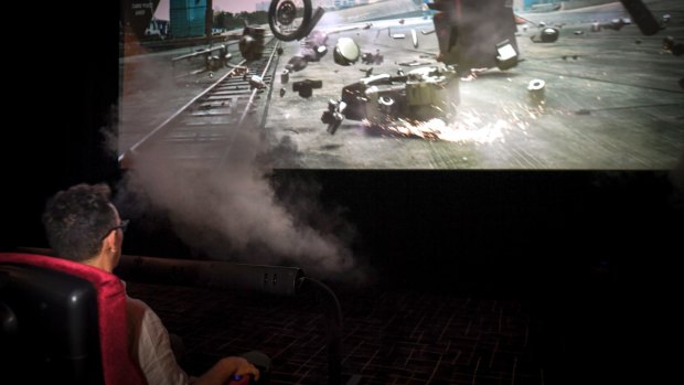 The on-screen action triggers physical effects in the cinema seat and surrounds.