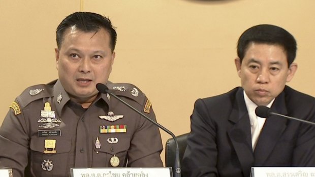 Thai Police Major Genenal Kornchai Klaiklung, left, the head of the anti-human trafficking wing of the police, and government spokesman Sansern Kaewkamnerd, right, speak at a news conference in Bangkok earlier this week. 