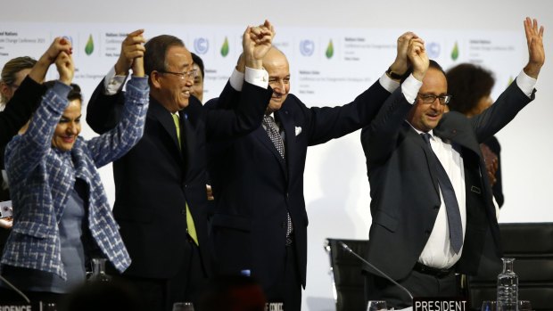 United Nations climate change chief Christiana Figueres, left, UN Secretary-General Ban Ki-moon, French Foreign Affairs Minister and UN Climate Change Conference in Paris president Laurent Fabius and French President Franois Hollande celebrate the Paris agreement on climate change in 2015.