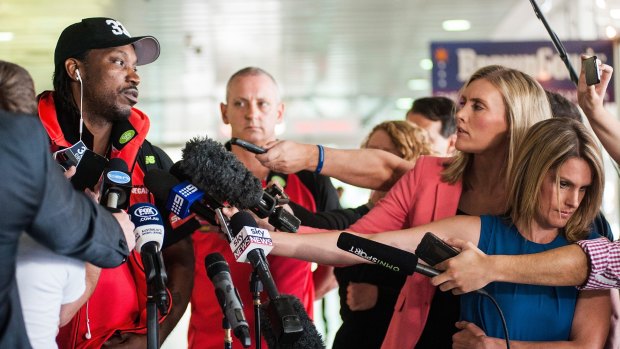 Inappropriate: Chris Gayle faces the media at Melbourne airport.