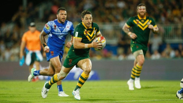Passing on his knowledge: Billy Slater has been helping Valentine Holmes during Australia's World Cup campaign.