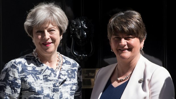British Prime Minister Theresa May, left, with Arlene Foster, the leader of Northern Ireland's Democratic Unionist Party on June 26.