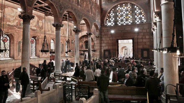 Inside the church of St Peter and St Paul in Abbasiya, central Cairo, following the bombing on Sunday.