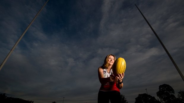 Marilynn Ross has got back into playing footy ... at 53. 