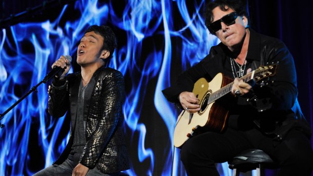 Arnel Pineda, left, and Neal Schon of the rock band Journey, which produced <i>Don't Stop Believin'</i>.