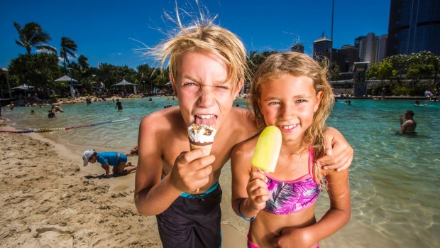 Malte Schjoth Kristensen (11) and his sister Mikkeline Schjoth Kristensen (8) enjoy ice creams at Streets Beach.