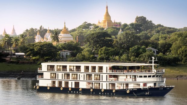 The Sanctuary Ananda sails on the Irrawaddy River past Sagaing.