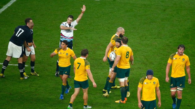 Defining moment: Referee Craig Joubert awards Australia a late match-winning penalty.