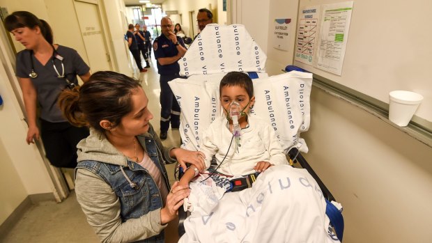 More than 8500 people were treated in Melbourne hospitals on Monday night and Tuesday: Rayann Zamani with mother Palli Zamani.