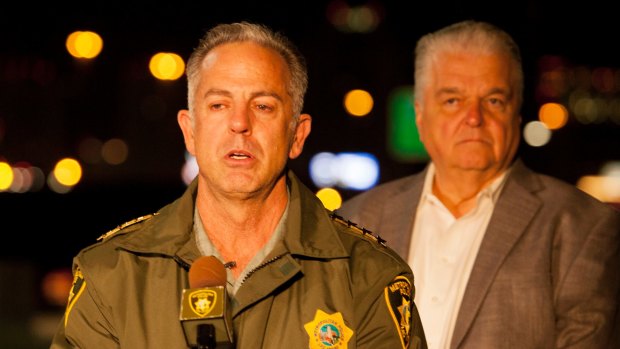 Clark County Sheriff Joe Lombardo, accompanied by Clark County Commission chairman Steve Sisolak, briefs the media on the Las Vegas massacre.