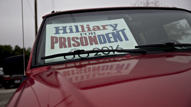 An anti-Clinton sign  sits in the window of a vehicle in Des Moines, Iowa.