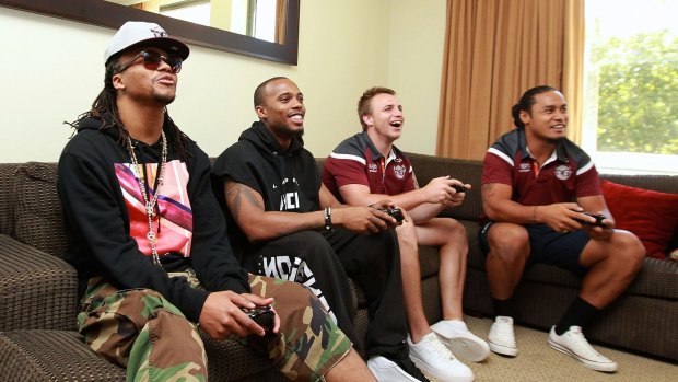 Beat that: Rappers Lupe Fiasco and B.o.B take on Sea Eagles Jamie Buhrer and Steve Matai in FIFA 15 on Xbox One.
