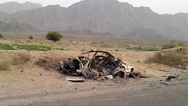 This photo taken by Abdul Salam Khan using his  phone on May 22, 2016, purports to show the destroyed vehicle in which Afghan Taliban leader Mullah Mohammad Akhtar Mansour was travelling in Pakistan's Balochistan province.