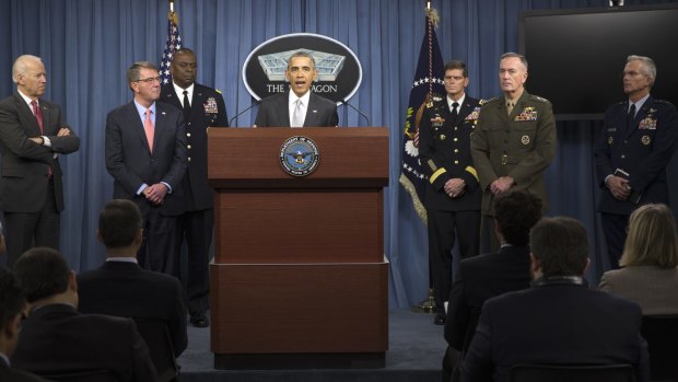 President Barack Obama, accompanied by Defence Secretary Ash Carter and Commander of US Central Command General Lloyd Austin, at the Pentagon on Monday. 
