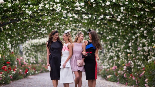 Models Laura Henshaw, Jodie Lee, Georgia Mitchell and Anna McEvoy at Flemington for the launch of the Melbourne Cup Carnival. 