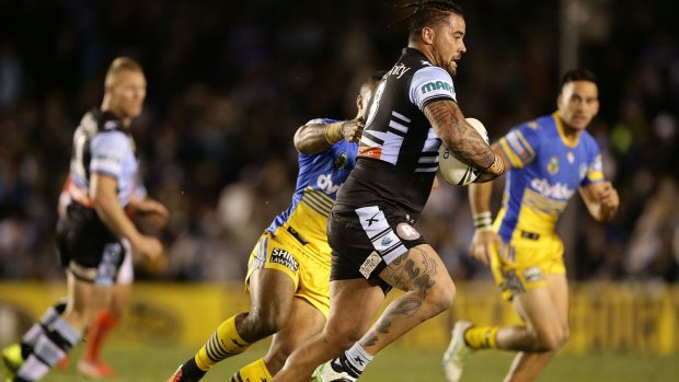Front-foot ball: Andrew Fifita charges forward for the Sharks.