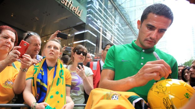 Sign here: Tim Cahill is off to China.
