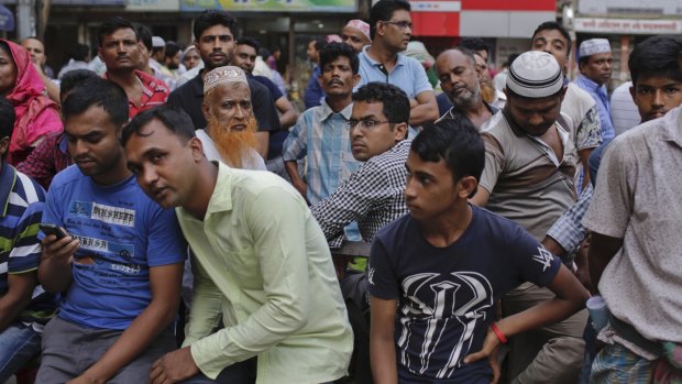 Dozens of people gathered outside the Dhaka Central Jail in Dhaka, Bangladesh, on Sunday.