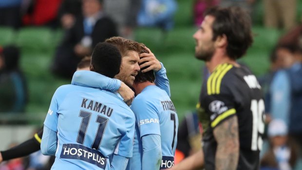 Another three points in the bag: Melbourne City players react after the final whistle.