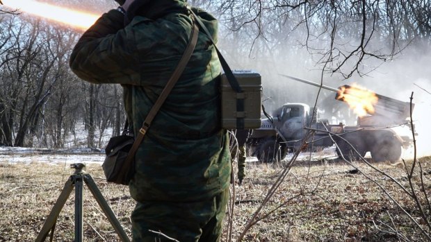 Pro-Russian rebels stationed in the eastern Ukrainian city of Gorlivka, Donetsk region, launch missiles towards the Ukrainian forces in Debaltseve.