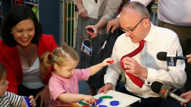 NSW Opposition Leader Luke Foley talks about the colour red, during his visit with Londonderry candidate Prue Car to a childcare centre in Blaxland, during the NSW state election campaign on Friday.