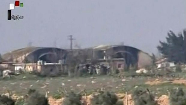 Burnt and damaged hangars after they were attacked by US Tomahawk missiles on Friday.