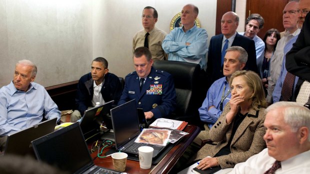 Vice President Joe Biden, President Obama and Secretary of State Hillary Clinton receive an update on the Osama bin Laden mission. 