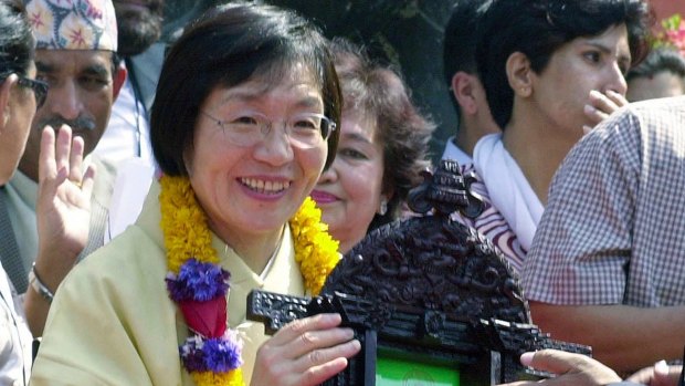 Junko Tabei receives a gift from a Kathmandu city official in Nepal in 2003.