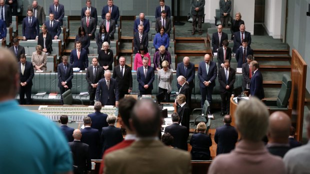 The Parliament of Australia stand to observe the victims of Manchester during question time  on Tuesday.