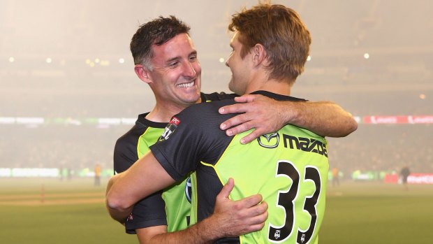 Clinched it:  Michael Hussey celebrates with Shane Watson after winning the Big Bash League final against Melbourne Stars.
