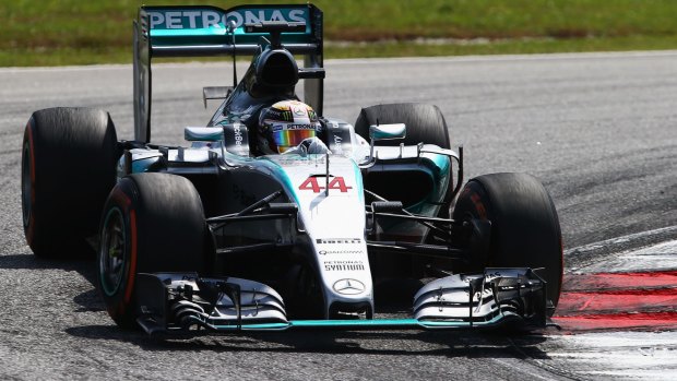 Confused: Lewis Hamilton was beaten on the track by Ferrari.