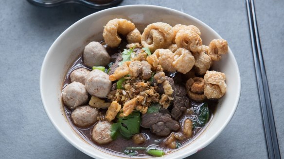 Thai boat noodles with beef and pork crackling.