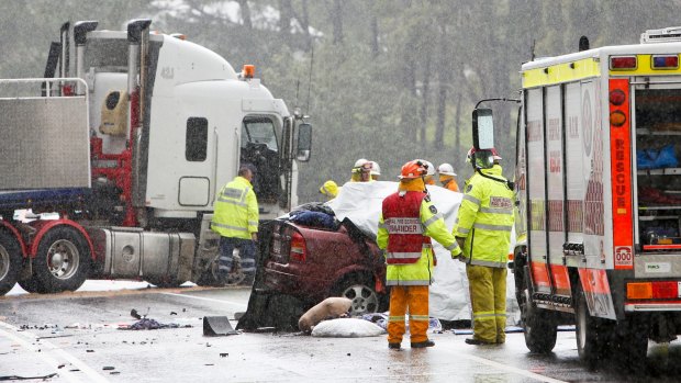 An accident involving a sedan and a truck on the Princes Highway near Berry, NSW, last year.